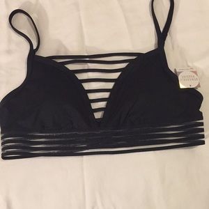 NWT. VS PINK size XS black, light support bra.